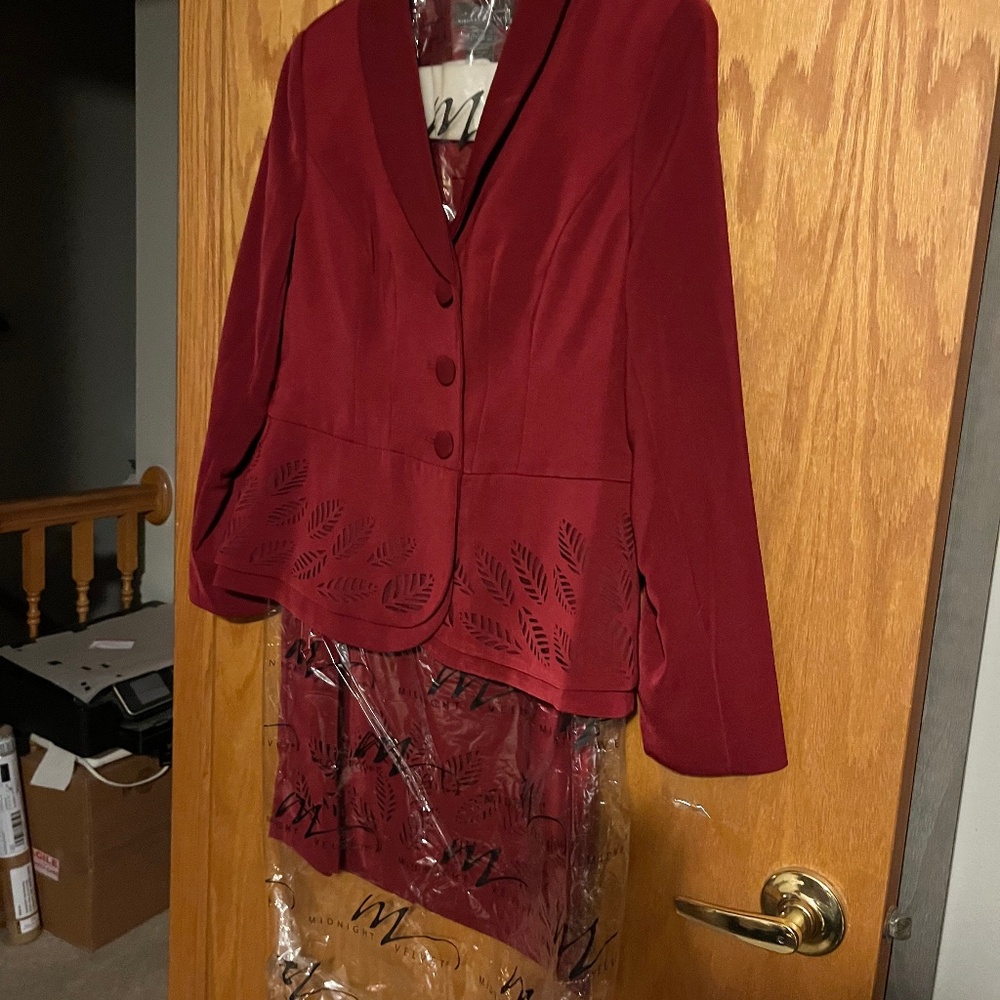 Maroon suede skirt suit with cutouts